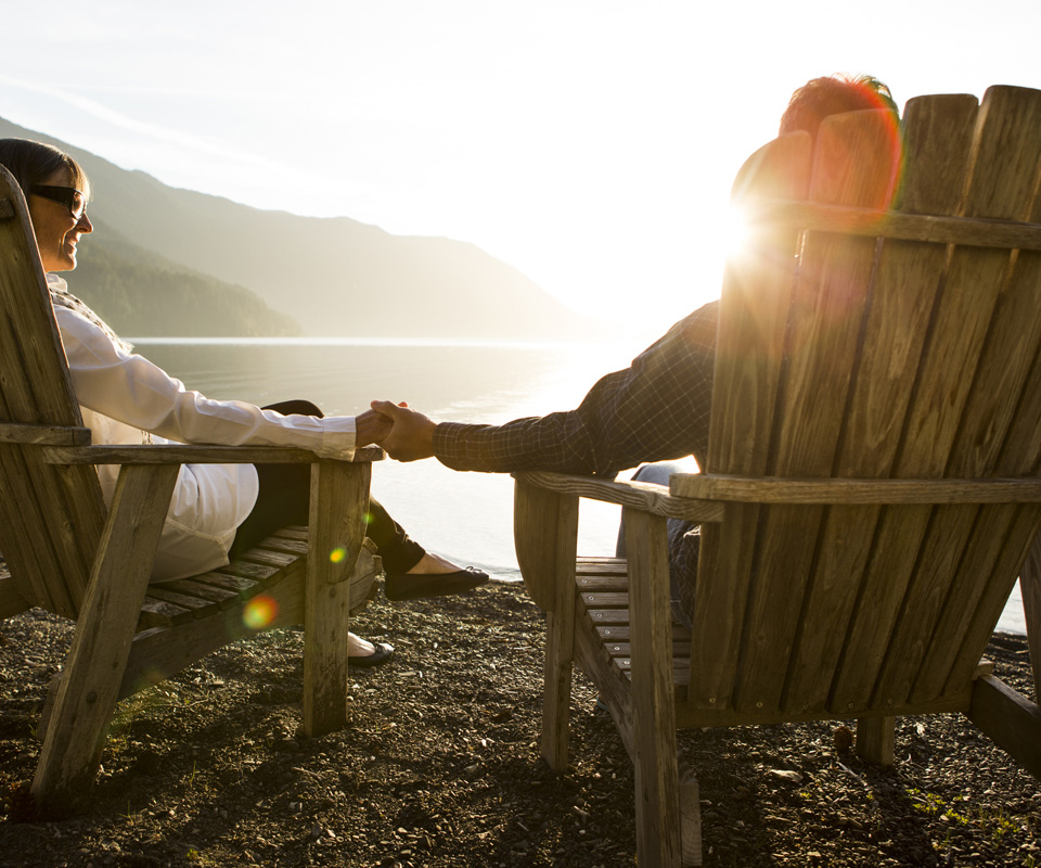 Couple holding hands at lunch