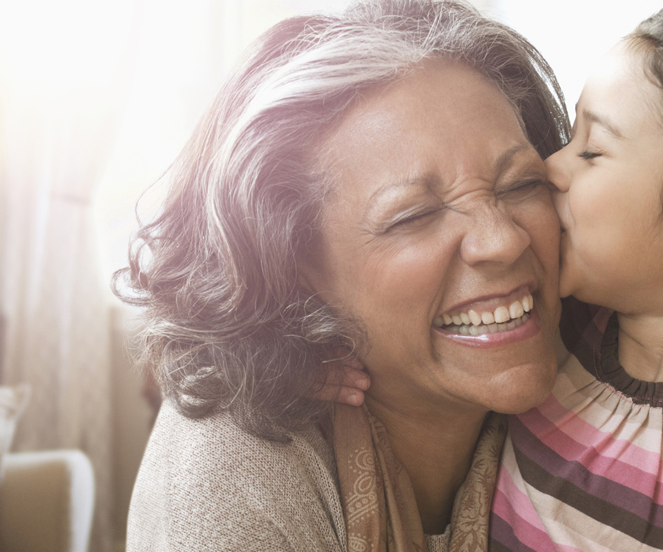 card-laughing-woman-grandchild Laughing woman with grandchild