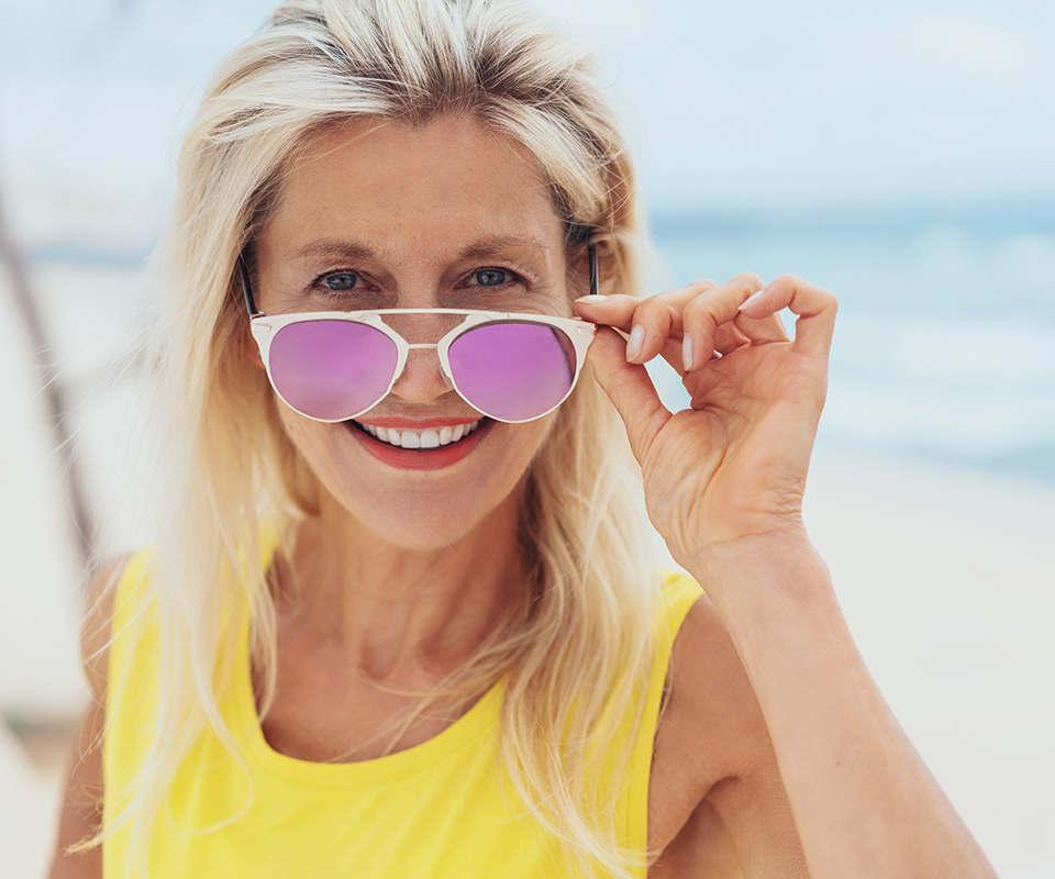 Mature woman wearing sunglasses