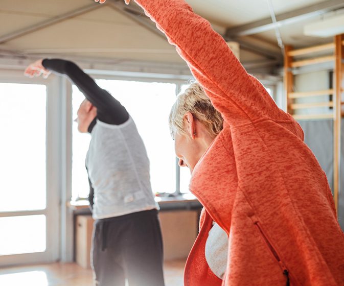 gym-benefits-card Senior Exercising